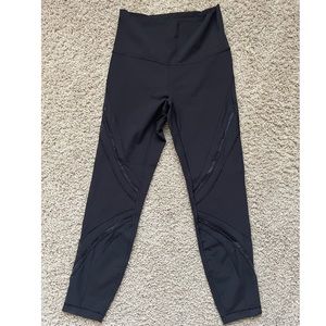 Black leggings 24” inseam with see-through design cuts size 6